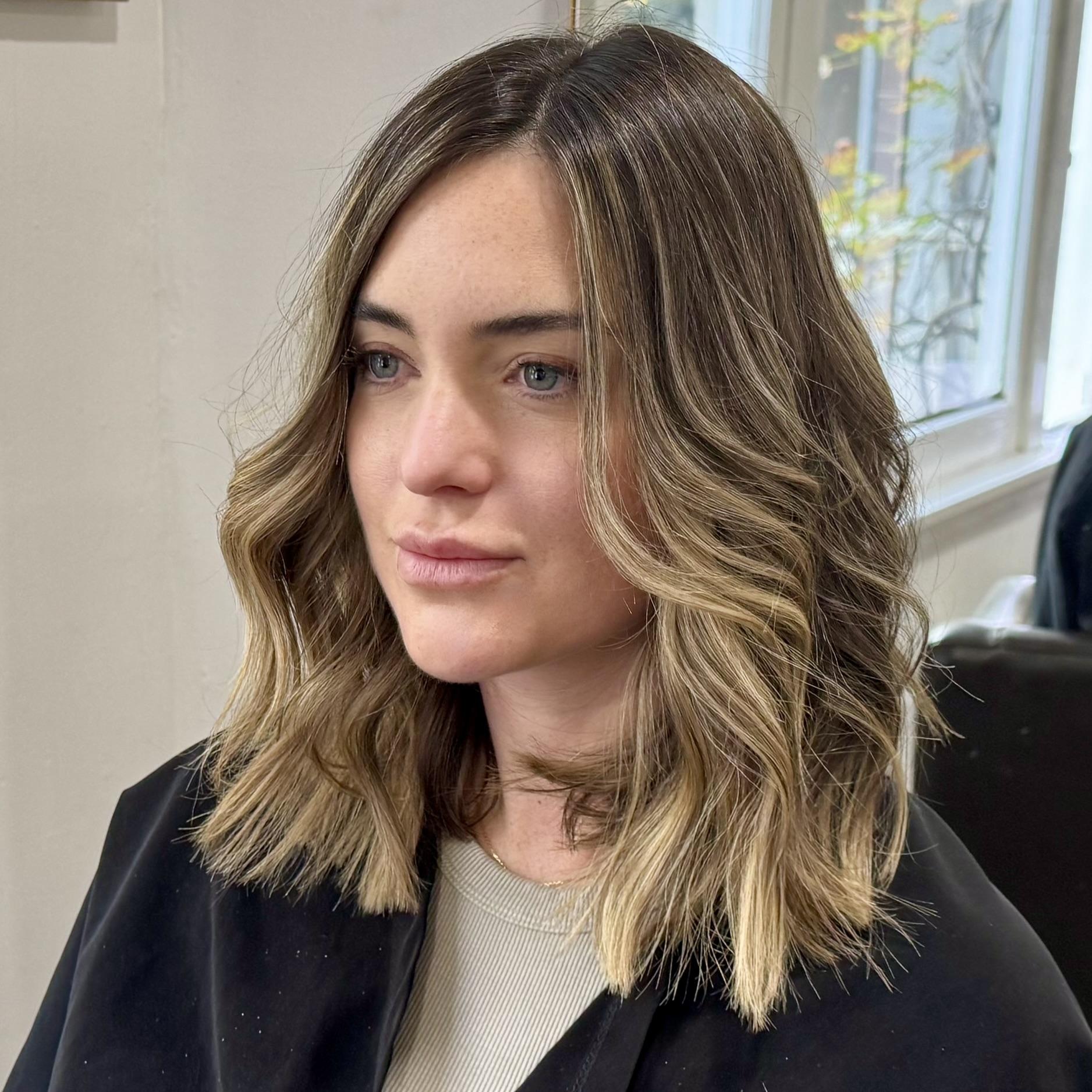 extured point cut West Hollywood on shoulder-length hair